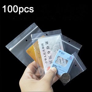 Disposable plastic anti-theft security tags for retail store security, 100pcs bulk, easy to attach to products, prevent theft, suitable for clothing, electronics, and merchandise.