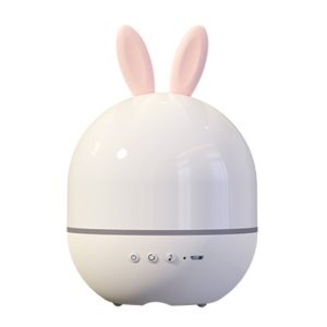 White humidifier shaped like a rabbit with pink ears and control buttons on the front.