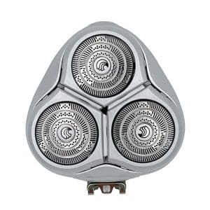 Close-up view of an electric shaver head featuring three circular blades.