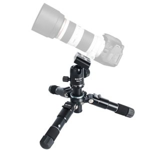 Remote camera lens with tripod for professional photography and videography.
