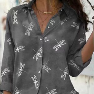 Gray button-up shirt featuring a white dragonfly pattern across the fabric.