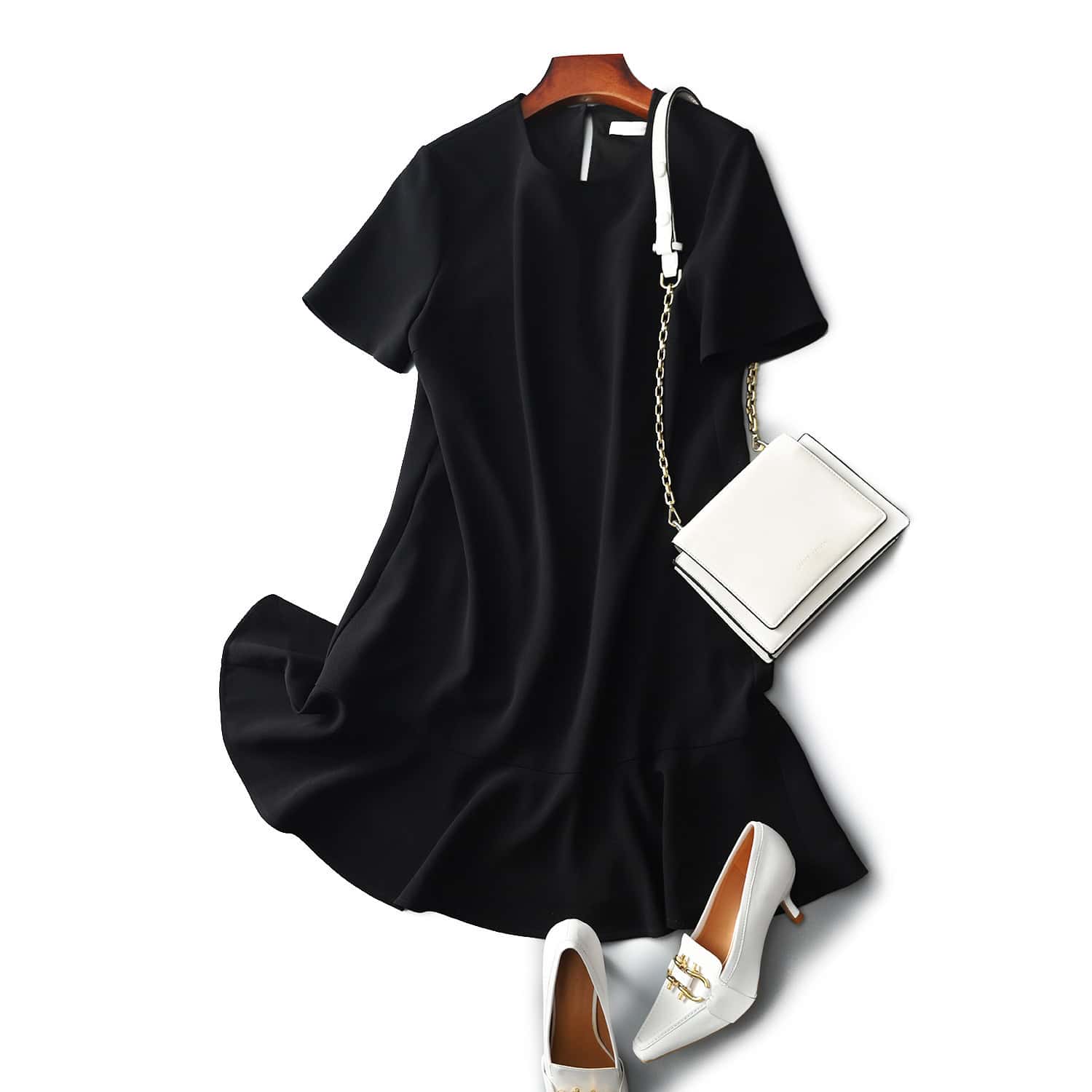 Luxurious French Entry Women's Dress - Redefining Elegance for Every Occasion 5 Elegant Black Dress With White Accessories, Including Shoes And Handbag, Ideal For Fashion-Forward Women. Perfect For Stylish Occasions, Emphasizing Sophistication And Chic Style.