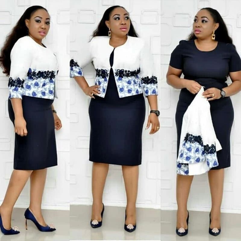 Stylishly Sophisticated Printed Jacket Dress Suit for Women - Elegant Choice 3 Elegant African Print Women'S Outfit Featuring A Navy Blue Pencil Skirt And A White Blazer With Blue Floral Embroidery, Perfect For Stylish Formal Occasions.