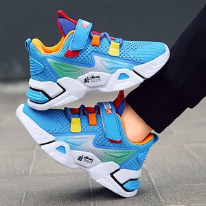 Blue athletic sneakers with yellow and red accents and a strap across the top.