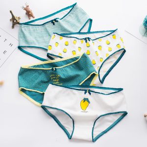 Light blue, white, and teal children's underwear with lemon and mango prints, colorful and fun design for kids, comfortable cotton fabric, perfect for everyday wear, featured on Syndmart.