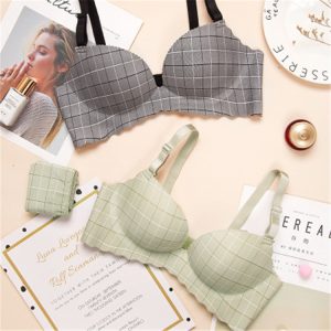 Silk-lined bras and matching accessories displayed on a flat surface for women's lingerie shopping and fashion accessories.