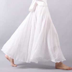 Silk white flowing skirt, elegant fashion dress, soft fabric, lightweight clothing, feminine style, casual or formal wear, luxury apparel, fashion statement, stylish outfit, women's clothing, trendy dress, comfortable attire, high-quality textile, stylish wardrobe addition, elegant movement, modern fashion design.