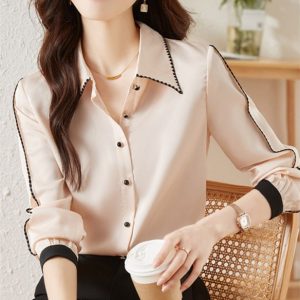 Elegant Silk Blouse With Black Trim Detailing, Ideal For Stylish Office Wear Or Casual Outings. Shop Trendy Women'S Fashion At Syndmart For Quality Clothing And Accessories.