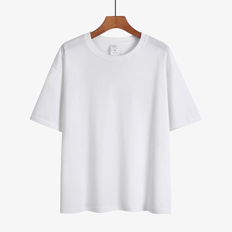 Classic Round Neck Drop Shoulder T-Shirt - Comfort meets Style! 8 Plain White Short Sleeve T-Shirt Displayed On A Wooden Hanger Against A White Background.