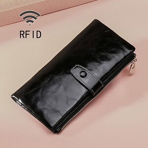 RFID black leather wallet with zipper and snap button closure for secure cash and card storage, modern design, ideal for women and men.