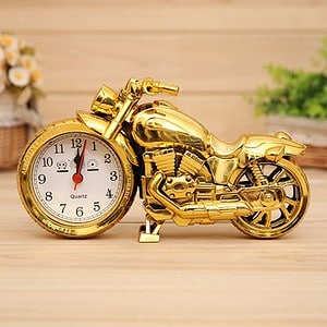 Golden motorcycle with a built-in clock, perfect for desk decor and gift ideas. Unique blend of motorcycle design and timekeeping functionality, ideal for motorcycle enthusiasts.
