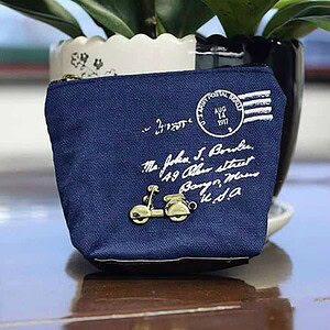 Blue canvas pouch with vintage postal stamp design and scooter charm, ideal for daily accessories or travel organizers within a stylish, durable carry-all for women and men at Syndmart.