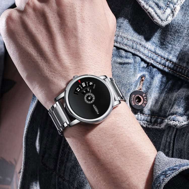 FNGEEN S230 Men's Quartz Watch - Timeless Elegance for Every Occasion 7 Luxury Men'S Watch With Digital Display And Metal Bracelet On Wrist Of A Person Wearing Denim Jacket.