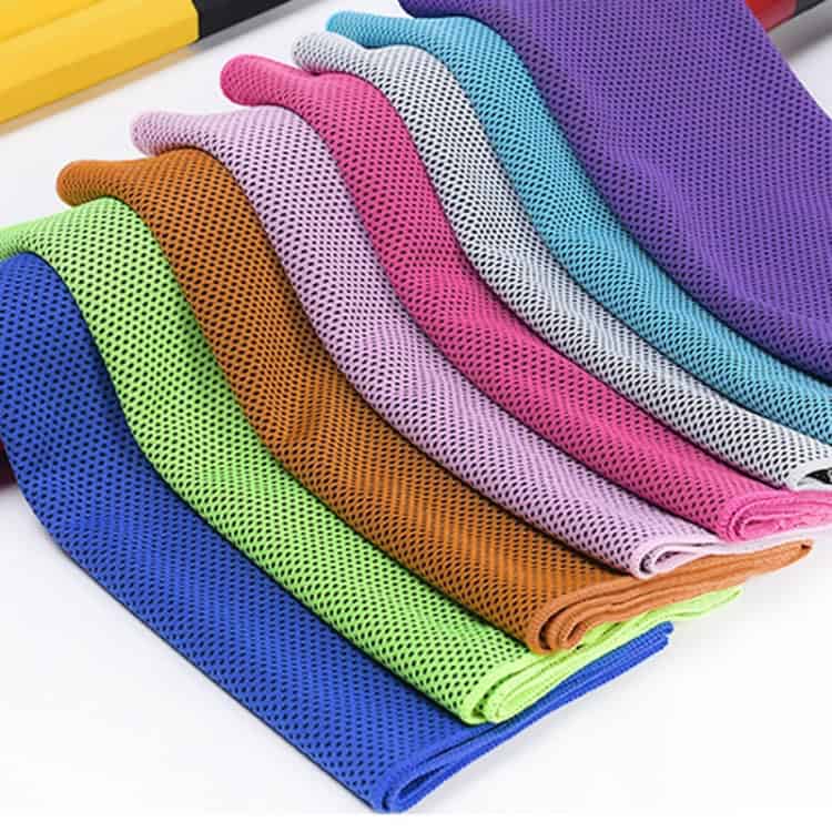 ChillFit Ice Cold Towel - Stay Refreshed & Cool Down Instantly 3 Brightly Colored Mesh Sports Jerseys In Blue, Green, Orange, Pink, Purple, Black, White, And Teal Arranged In A Fan Shape For Athletic Wear, Sports Uniforms, Or Activewear.