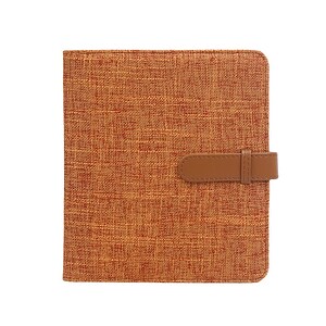 Premium fabric planner with leather strap closure, ideal for organizing schedules and notes for enhanced productivity. Perfect for professionals seeking a stylish and functional stationary accessory.