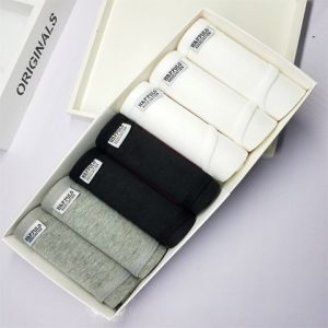 Soft cotton crew socks in white, black, and gray colors displayed in a stylish gift box, ideal for casual wear and everyday comfort.