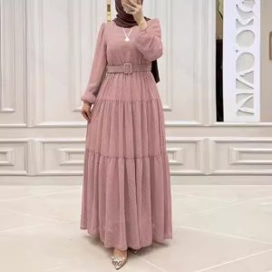 Elegant pink modest maxi dress with long sleeves, belted waist, and layered skirt, perfect for special occasions and religious events. Stylish and comfortable for women seeking fashionable modest wear.