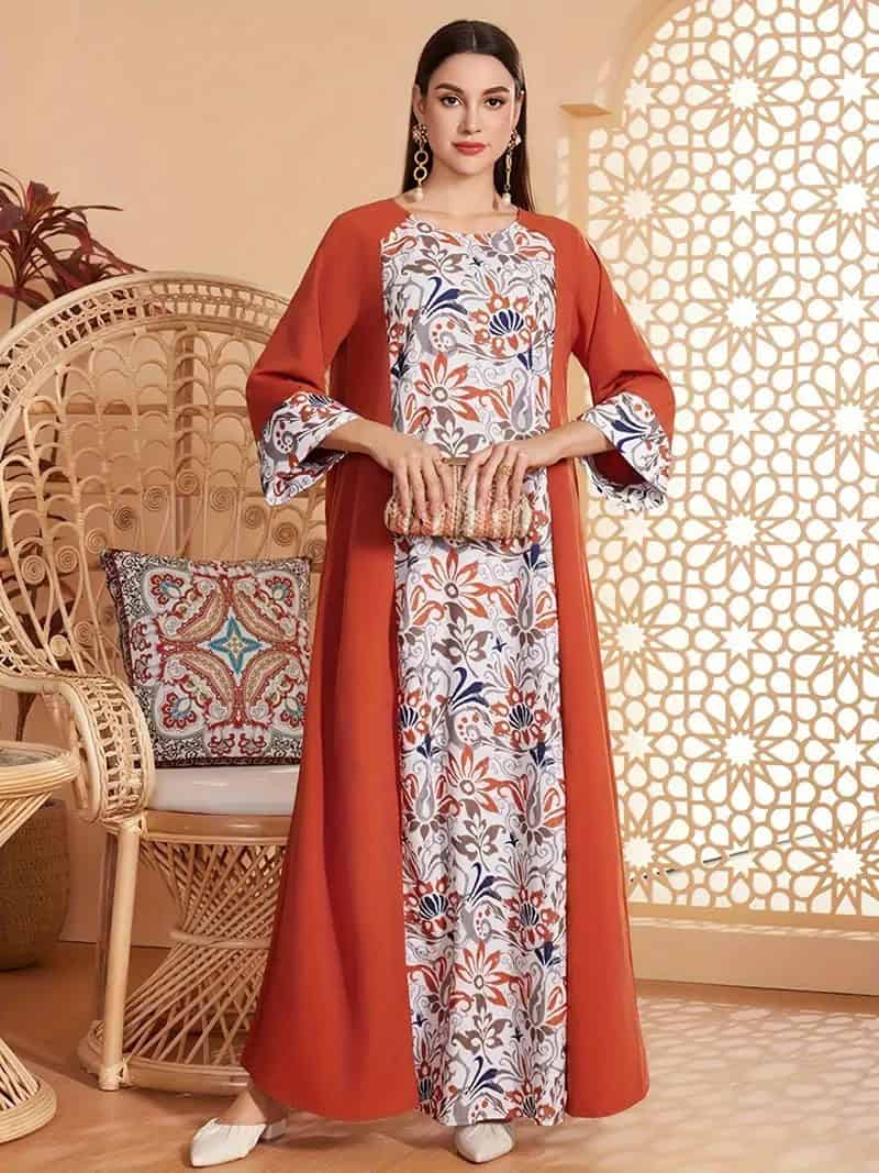 'Floral Print Long Sleeve Abaya Robe Dress - Timeless Elegance & Beauty' 1 Elegant Model Wearing Stylish Ethnic Kurta With Floral Print And Orange Coat, Showcasing Traditional Fashion For Women. Perfect For Festive And Casual Occasions, Blending Modern And Classic Design.