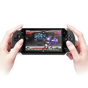 Fight Video Game On Portable Gaming Console With Animated Characters And Vibrant Graphics Showcasing Gaming Entertainment.