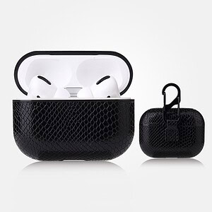 Wireless earbuds in a textured black charging case with matching protective cover, ideal for portable audio and tech accessories.