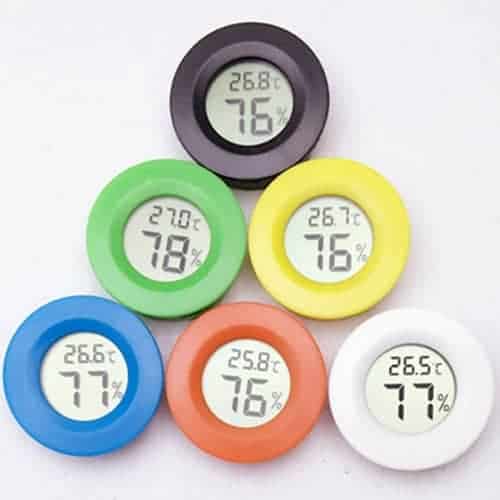 Digital Round Reptile Box Centigrade Thermometer & Hygrometer with Screen Display 6 Digital Thermometers In Various Colors Displaying Temperature And Humidity Readings.