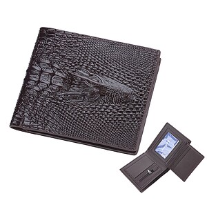 Brown crocodile leather wallet with a textured surface and a zippered compartment for cards.