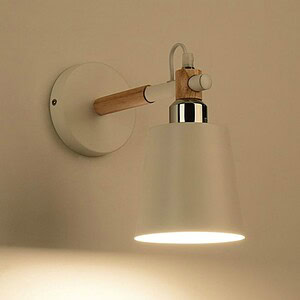 Modern wall-mounted lamp with wooden and metal accents for stylish home lighting.