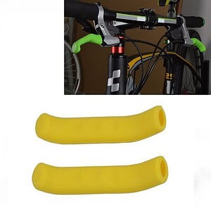 Yellow bicycle handlebar grips, designed for comfort and control, ideal for enhancing bike riding experience. Suitable for mountain bikes, road bikes, and fitness bikes. High-quality cycling accessories.